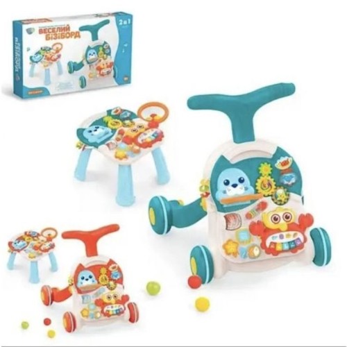 Каталоака-ходунки 44х47х47 см зі столиком 33х37х24 см, музикою та світлом, рухомими деталями та ксилофоном, на батарейці, в асортименті, у коробці 68х39х11 см