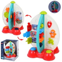 Бізі-ракета 18х18х25 см музична зі світлом, шестернями, засувками, лічильником, лабіринтом та іншими рухомими деталями, на батарейці, у коробці 21х28х20,5 см.