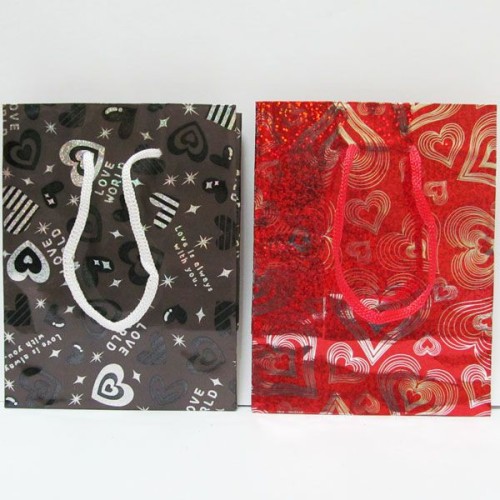 Пакет папір 27 х 23 х 10 см, в асортименті «Голограма - сердечка»