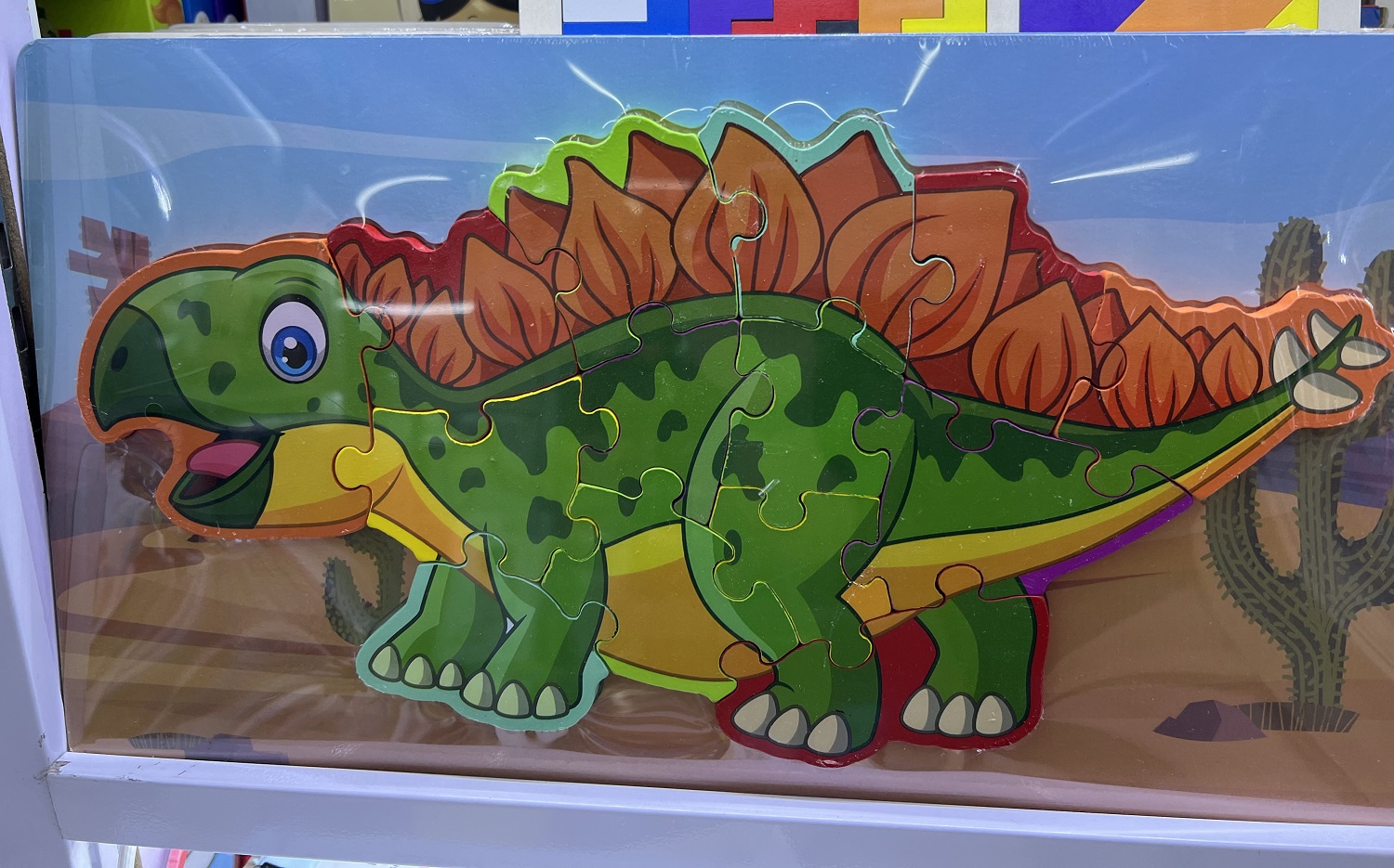 Дерев'яна іграшка «Динозавр», вкладиш-пазл, в асортименті, у плівці 40х22,5 см