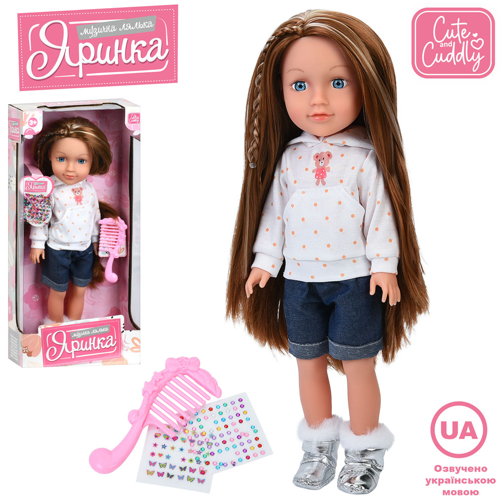 Лялька «Яринка» 40 см музична з українською озвучкою. гребінецем, стразами-накліпками, на батарейці, у коробці 20х43х9,5 см.