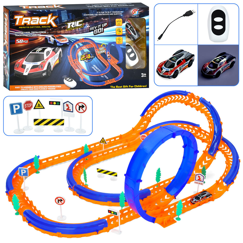 Трек 458/78х54х26 см на 58 деталей та машинка 8 см р/к 2,4G на акумуляторі зі світлом, USB та дорожніми знаками, у коробці 48х27х7 см.