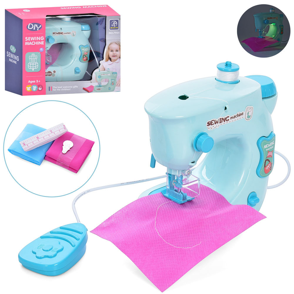 Швейна машина 17 см зі світоом, тканиною, нитками, шиє, на батарейці, у коробці 23х18х9 см