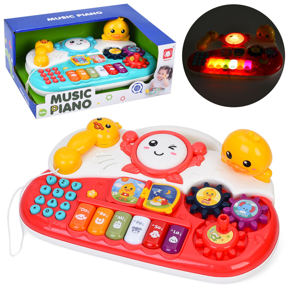 Піаніно 25х18х8 см музичне зі світлом та звуком, перемикачем режимів, телефоном, шестернями, барабаном, на батарейці, у коробці 26,5х11х19 см