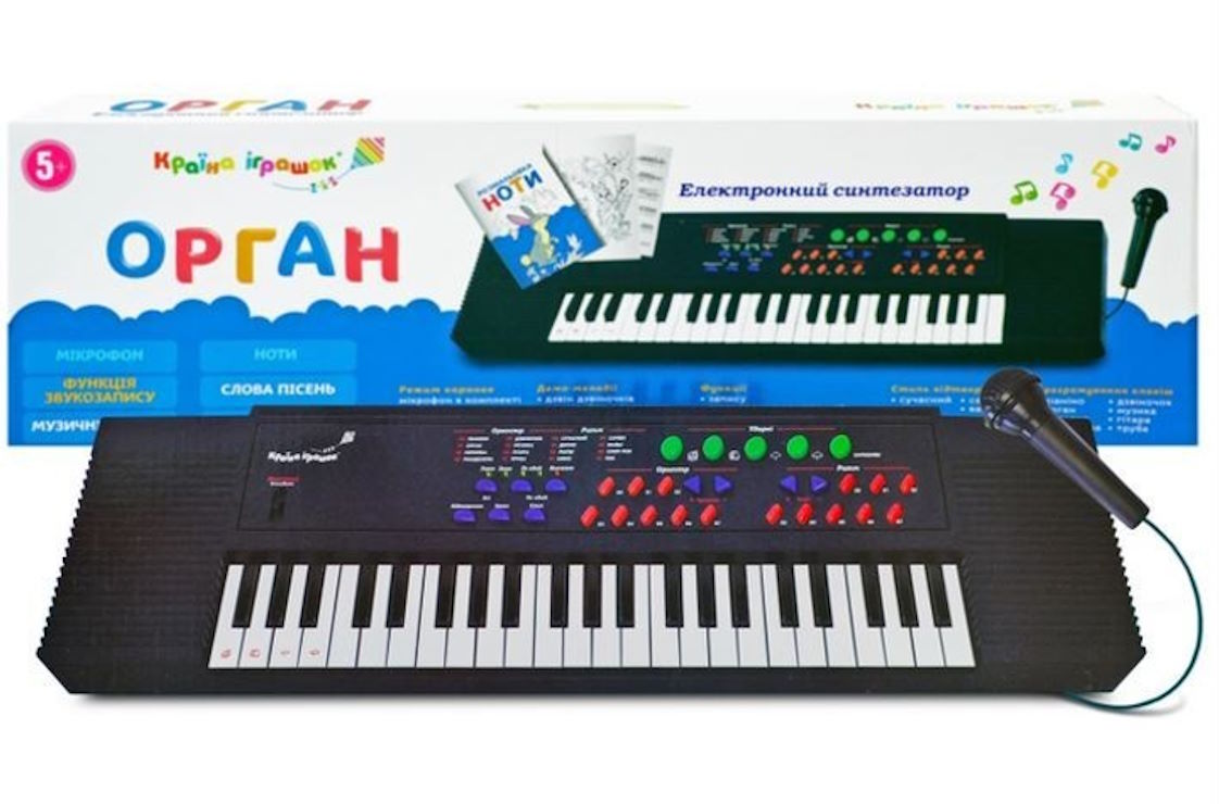 Синтезатор на 3,5 октави та 8 ритмів з мікрофоном та книгою нот,від мережі або батарейки, у коробці 78,5х8,5х2 см
